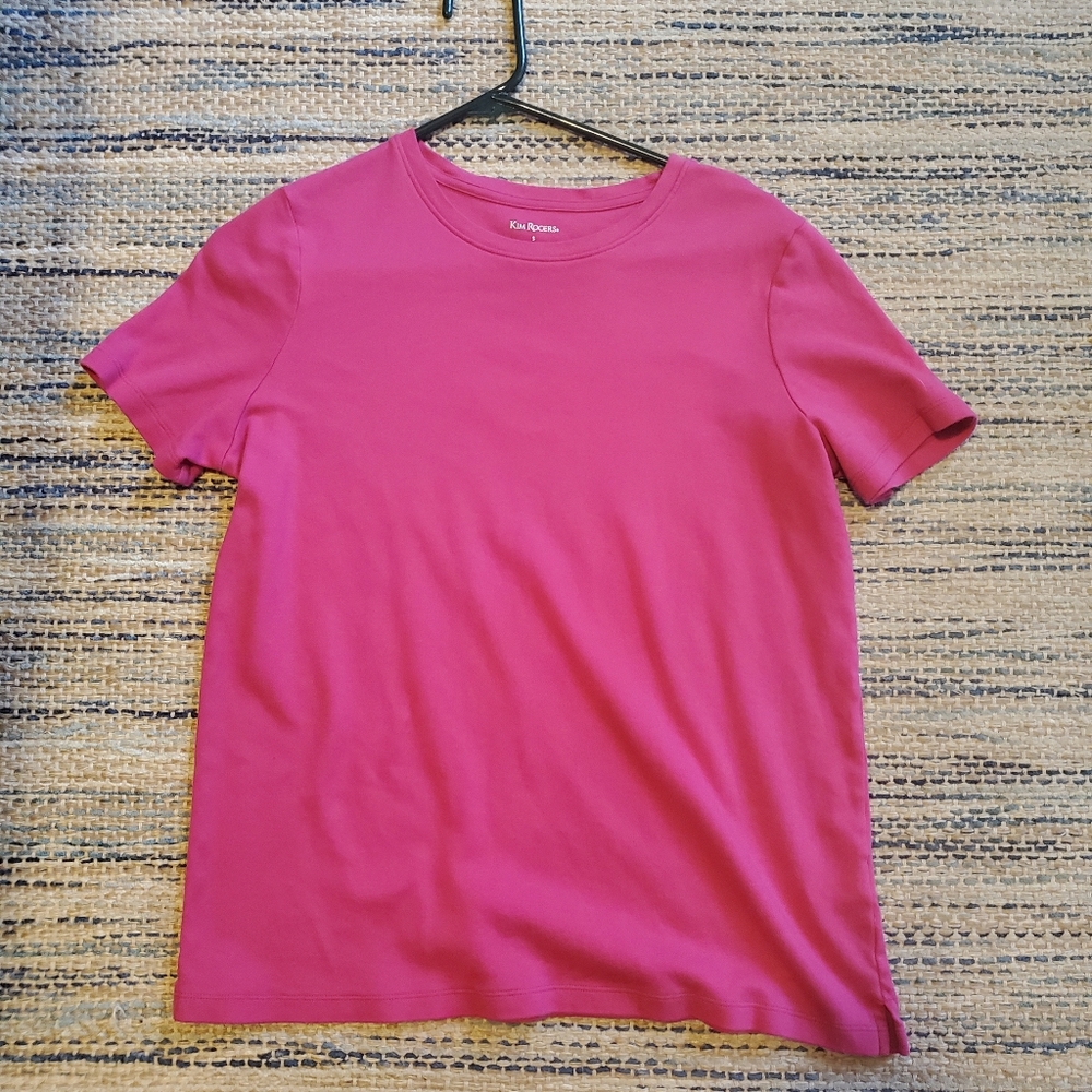 Kim Roger's bright pink shirt
